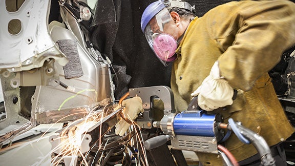 Collision Center Technician Repairing Vehicle | Findlay Toyota Prescott in Prescott AZ